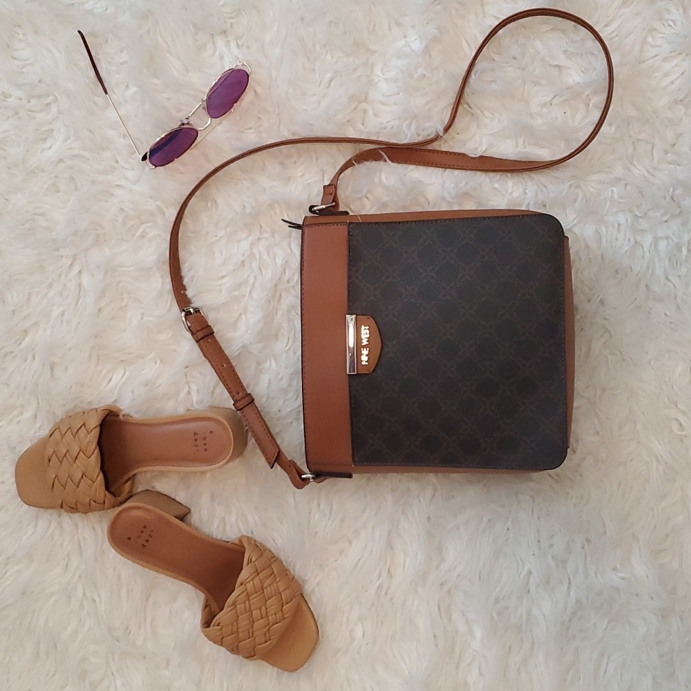 Nine West purse with adjustable strap.